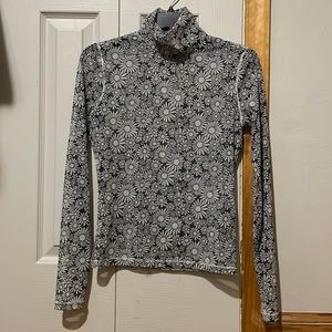 Long sleeve sheer blouse from Levi’s. Size small. Black and gray.